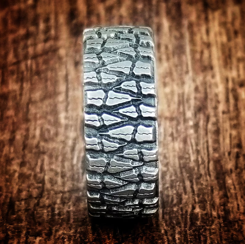 Mud Claw Titanium Ring: Truck Tire Tread Wedding Band