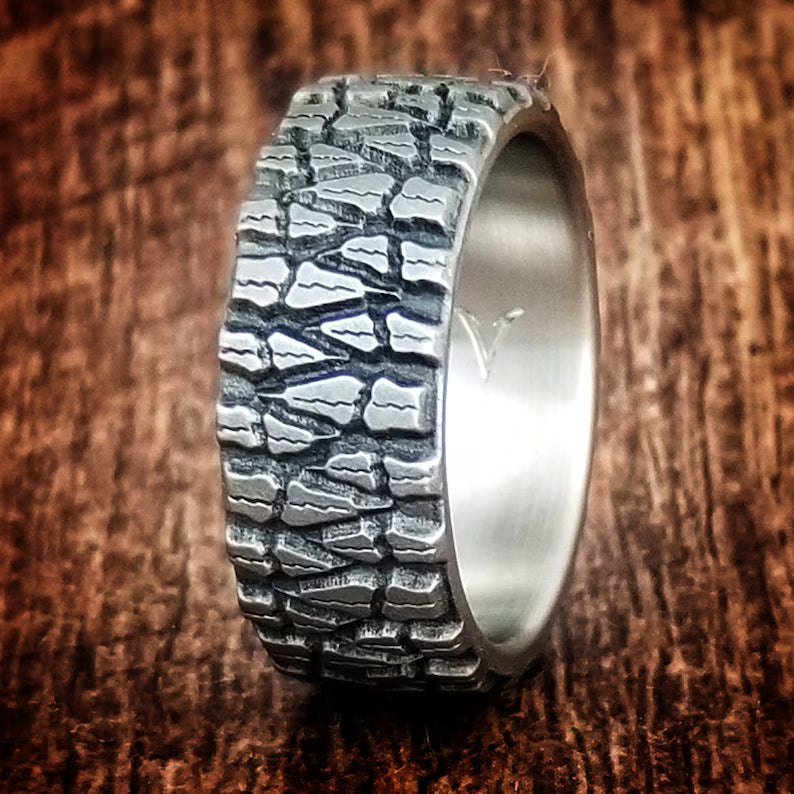 Mud Claw Titanium Ring: Truck Tire Tread Wedding Band